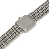 PATEK PHILIPPE, REF. 4244/2, A VERY FINE AND RARE 18K WHITE GOLD AND DIAMOND-SET BRACELET WATCH - photo 3