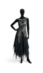 A BLACK LEATHER ONE-SHOULDER TOP AND BLACK TULLE SKIRT