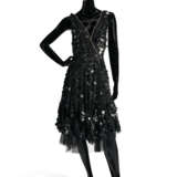 A BLACK SEQUIN AND PAILLETTE-APPLIED TULLE COCKTAIL DRESS - фото 1