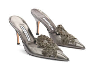 A PAIR OF RHINESTONE-APPLIED SILVER LEATHER MULES