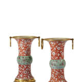 A PAIR OF ORMOLU-MOUNTED CORAL, GREEN AND AUBERGINE-DECORATED VASES - photo 1