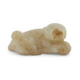 A WHITE AND RUSSET JADE 'BOY AND BUDDHIST LION' GROUP - photo 1