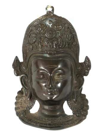 Wandmaske der Göttin Tara Indien, Ende 20. Jh., Metallg - фото 1