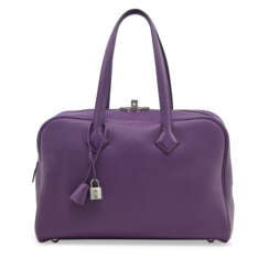 AN ULTRA VIOLET CLÉMENCE LEATHER VICTORIA 36 WITH PALLADIUM HARDWARE