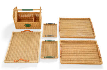 A GROUP OF SIX: FIVE WICKER & SWIFT LEATHER RECTANGULAR TRAYS AND A WICKER BASKET