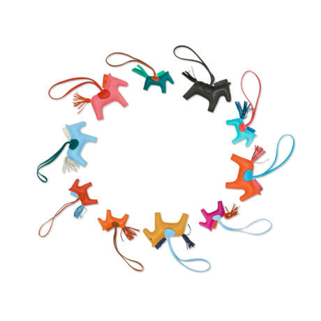 A GROUP OF TEN LEATHER "GRIGRI RODEO" CHARMS - фото 1