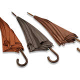 A SET OF THREE: POTIRON, ÉTOUPE & GOLD CANVAS PLUIE DE H LONG UMBRELLAS WITH TINTED MAPPLE WOOD - фото 1