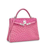 A FUCHSIA OSTRICH LEATHER RETOURNÉ KELLY 32 WITH PALLADIUM HARDWARE - photo 2