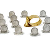 A GROUP OF THIRTEEN: A GOLD PLATED NAPKIN RING AND TWELVE SILVER PLATED NAME TAGS - фото 1