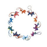 A GROUP OF TEN LEATHER "GRIGRI RODEO" CHARMS - photo 1