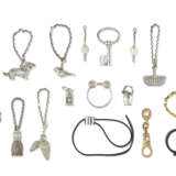 A GROUP OF SEVENTEEN BAG CHARMS AND KEY RINGS - фото 1