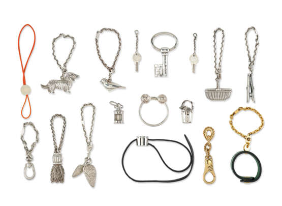 A GROUP OF SEVENTEEN BAG CHARMS AND KEY RINGS - фото 1