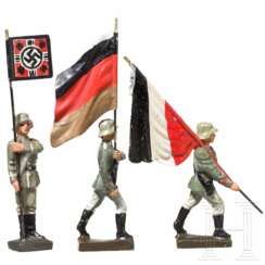 Drei Lineol Soldaten des Heeres - StandartentrÃ¤ger, SchulterfahnentrÃ¤ger sowie TrÃ¤ger mit schwarz-rot-goldener Fahne