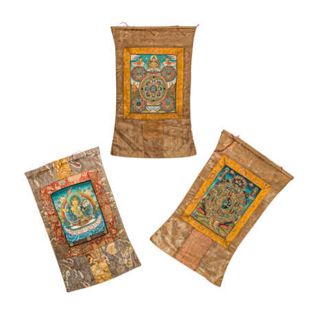 Three thangkas in fabric mount. TIBET, 19th/20th century: - фото 4