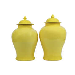 Pair of lemon yellow glazed lidded vessels, CHINA