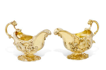 A PAIR OF GEORGE II SILVER-GILT CREAM BOATS