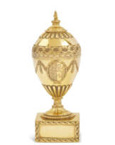 A GEORGE III GOLD VASE AND COVER