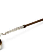 Cooking and serving tools. A GEORGE II SILVER TODDY LADLE