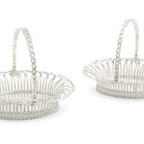 A PAIR OF GEORGE III SILVER CAKE BASKETS - фото 1