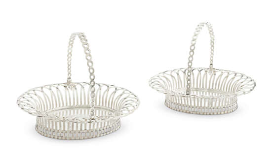 A PAIR OF GEORGE III SILVER CAKE BASKETS - photo 1