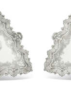 John White. A PAIR OF GEORGE II SILVER SALVERS OR KETTLE STANDS