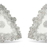 A PAIR OF GEORGE II SILVER SALVERS OR KETTLE STANDS - фото 1
