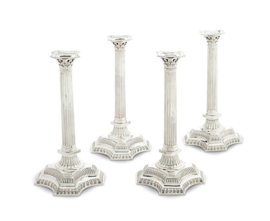 A SET OF FOUR GEORGE II SILVER CANDLESTICKS - фото 1