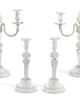 A SET OF FOUR GEORGE III SILVER CANDLESTICKS AND A PAIR OF TWO-LIGHT BRANCHES EN SUITE