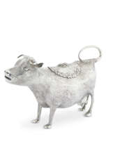 A GEORGE III SILVER COW CREAMER