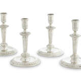 A SET OF FOUR WILLIAM III SILVER CANDLESTICKS - фото 1