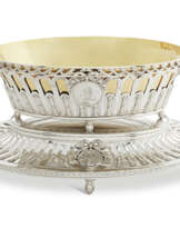 A GEORGE III BASKET AND STAND