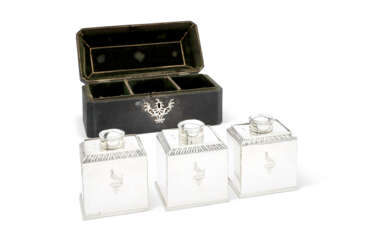 A PAIR OF GEORGE III SILVER TEA CADDIES AND MATCHING SUGAR BOX IN FISH SKIN CASE