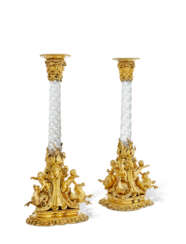 A PAIR OF VICTORIAN SILVER-GILT AND ROCK CRYSTAL CANDLESTICKS