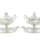A PAIR OF GEORGE III ROYAL SILVER SOUP TUREENS, COVERS AND STANDS - фото 2