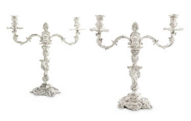 A PAIR OF GEORGE II SILVER CANDLESTICKS WITH GEORGE III BRANCHES EN SUITE