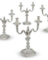 A SET OF FOUR GEORGE II SILVER TWO-LIGHT CANDELABRA