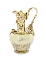 A GEORGE IV SILVER-GILT CLARET JUG AND COVER