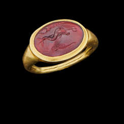 A ROMAN GOLD AND GARNET INTAGLIO RING
