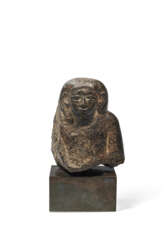 AN EGYPTIAN BLACK DIORITE MALE BUST