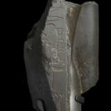 AN EGYPTIAN BLACK SCHIST FRAGMENT OF A FEMALE FIGURE - фото 3