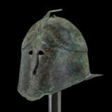 A GREEK BRONZE PSEUDO-CORINTHIAN HELMET - photo 2