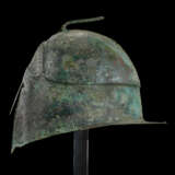 A GREEK BRONZE PSEUDO-CORINTHIAN HELMET - photo 3