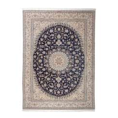 Oriental carpet with silk. NAIN/IRAN, signed, 20th century, ca. 350x252 cm.