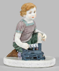 Jugendstil-Figur "Kind mit Lokomotive"