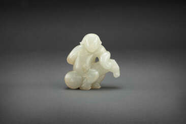 A PALE GREENISH-WHITE JADE CARVING OF A FOREIGNER RIDING A HOBBY HORSE