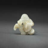 A PALE GREENISH-WHITE JADE CARVING OF A FOREIGNER RIDING A HOBBY HORSE - photo 2