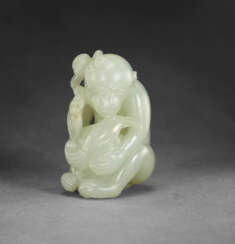 A SUPERB WHITE JADE CARVING OF TWO MONKEYS