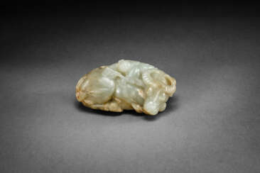 A WELL-CARVED MOTTLED GREEN AND BROWN JADE &#39;BUFFALO AND BOY&#39; GROUP