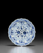 Yongle period. A VERY RARE SMALL BLUE AND WHITE BRACKET-LOBED DISH