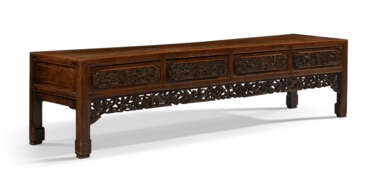 A LONG HUANGHUALI KANG TABLE WITH DRAWERS